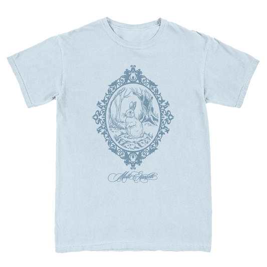 Light blue t-shirt with a decorative graphic of a rabbit in a frame